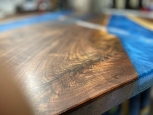 Epoxy river table, mounted to carbon steel legs